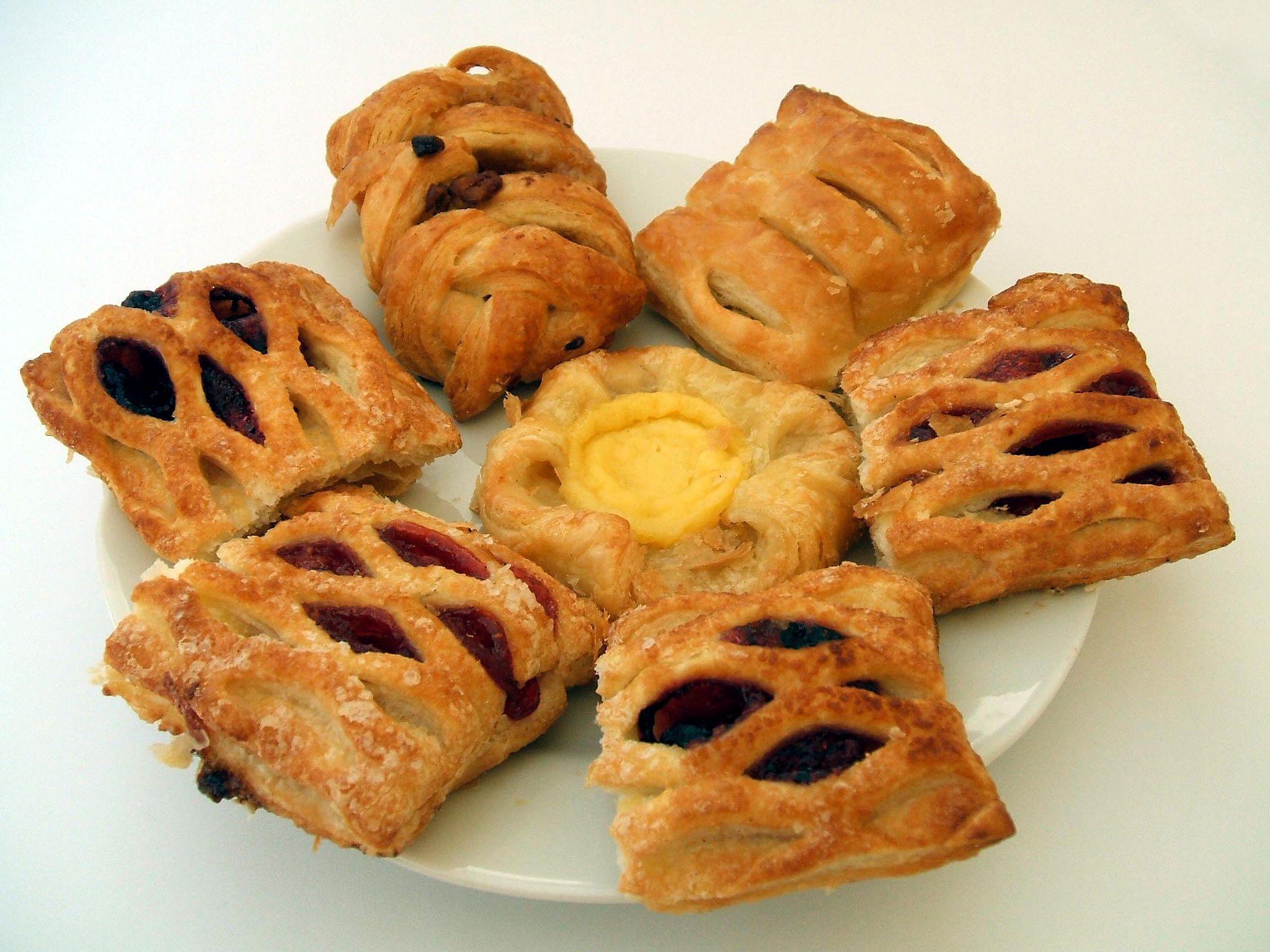 Cinnamon Buns at Sweet Home Bakery in Bowness Calgary - Warm, freshly baked cinnamon buns with swirls of cinnamon sugar and sweet glaze