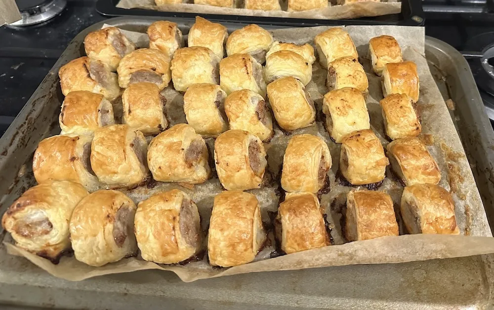 Sausage Rolls at Sweet Home Bakery in Bowness Calgary - Golden, flaky puff pastry wrapped around a savoury seasoned meat filling